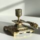 Patterned solid bronze hand candle holder