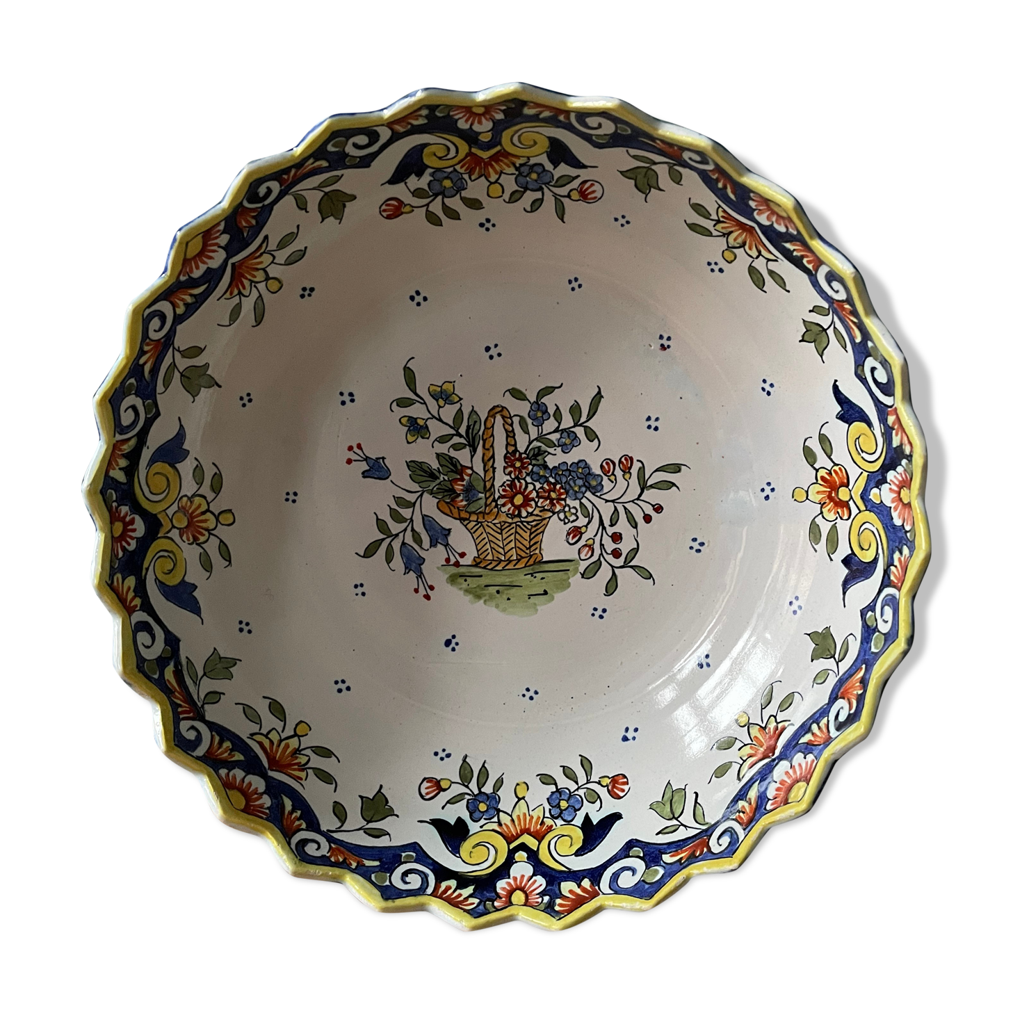 Hollow round dish in Rouen earthenware