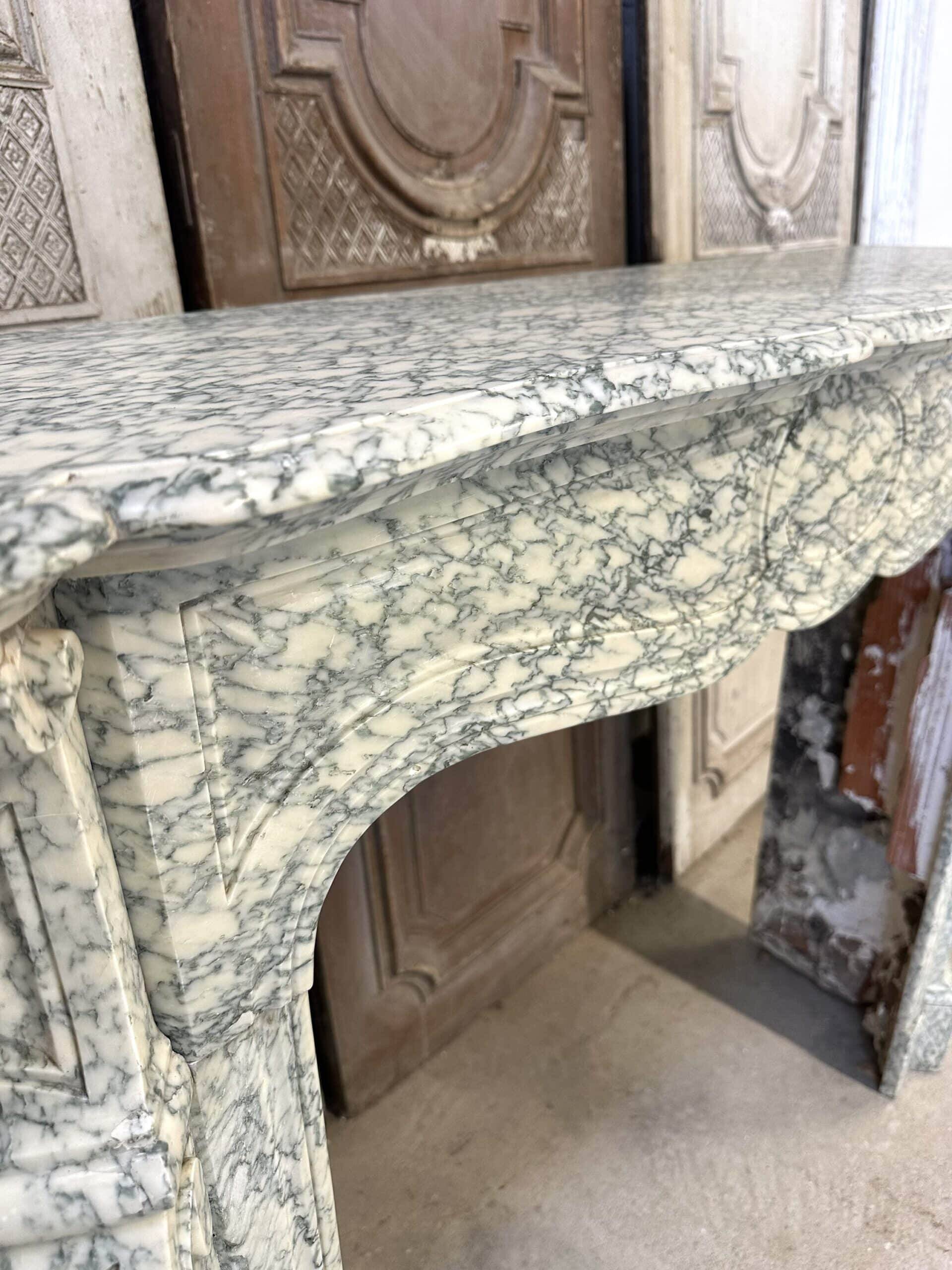 Cheminée en marbre vert style Louis XV