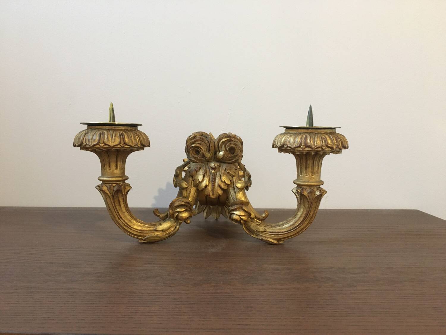 Golden wall candle holder