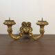 Golden wall candle holder