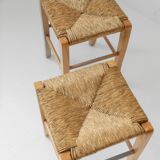 Lot of 2 vintage wooden stools from the 1980s, with hand-woven straw seats.