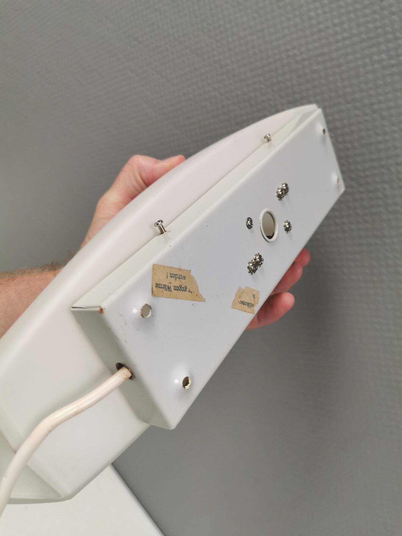 Wall lamp from Paulmann with white opal glass shade.