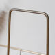 Vintage magazine holder in gold metal