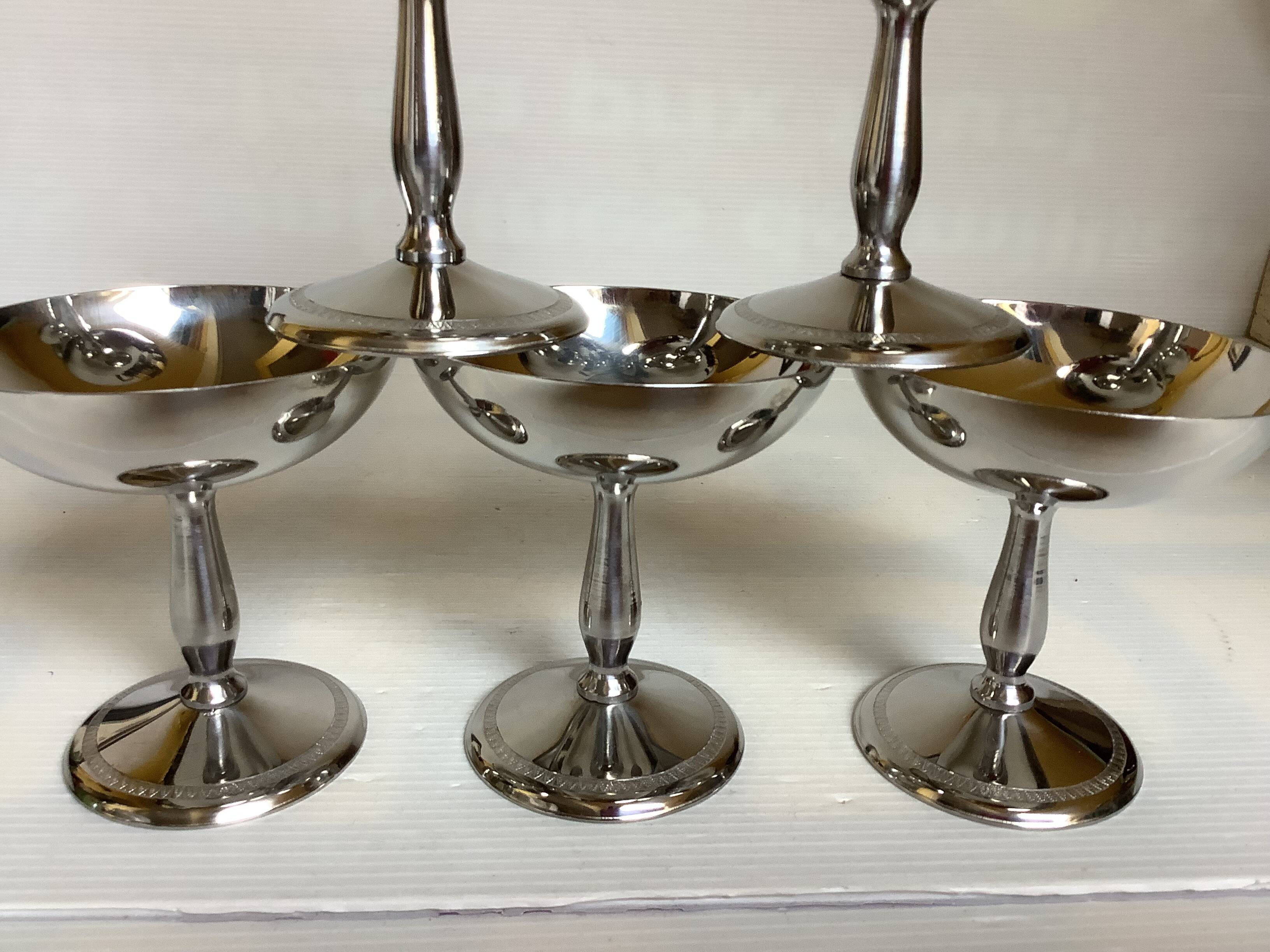 6 footed bowls with a silver metal ice frieze