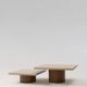 Noā nesting tables in waxed concrete with walnut legs