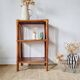 Shelf - rattan wood bookcase with a patina finish.