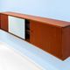 A.R.P. – Wall-mounted furniture in teak and opaline glass, 1950s