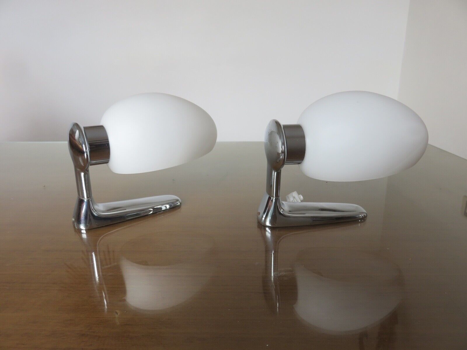 Wall lamps in chromed metal and opaline glass