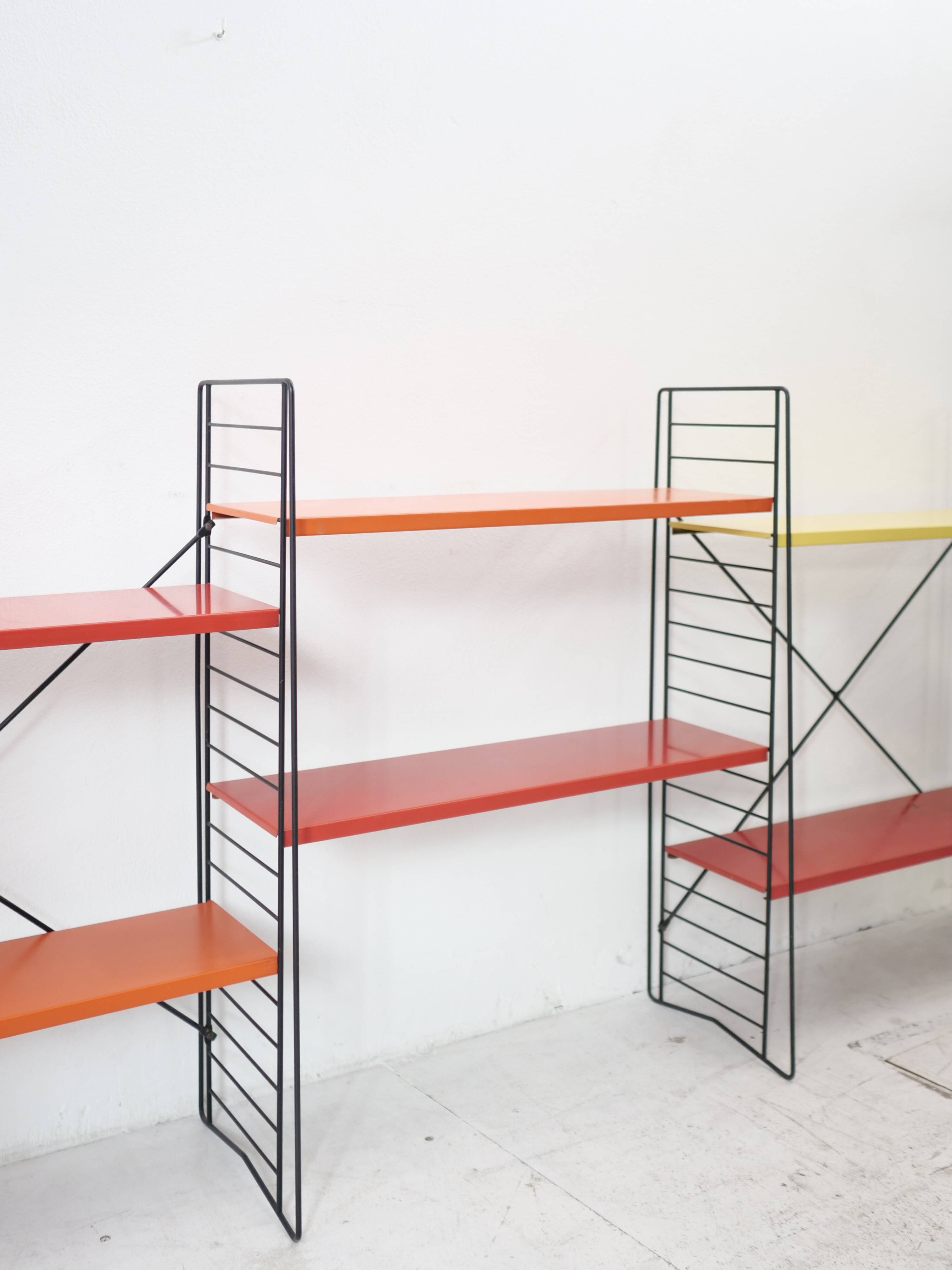 Tomado shelf in coloured metal floor shelves from 1958.