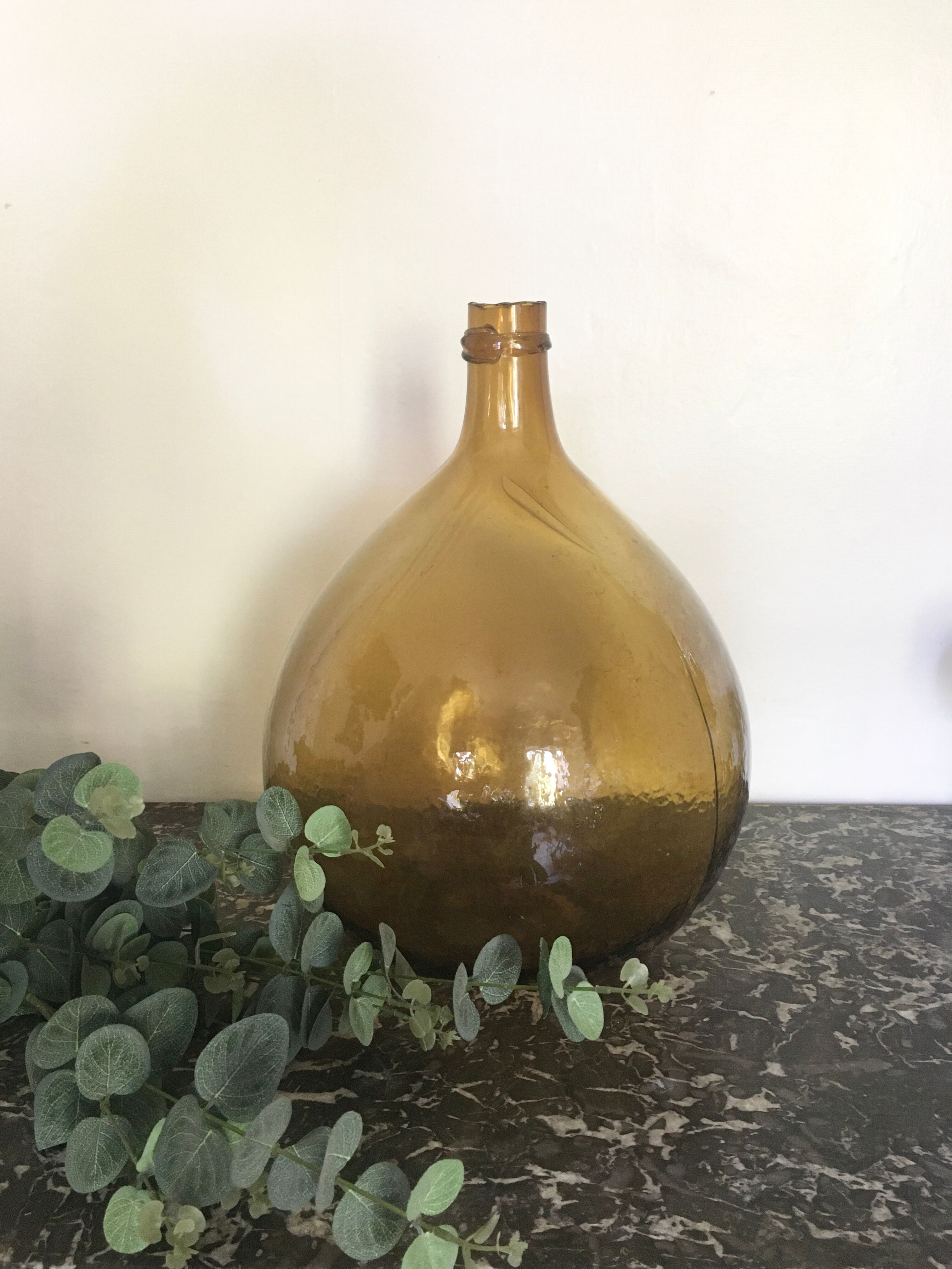 Amber color demijohn 10l