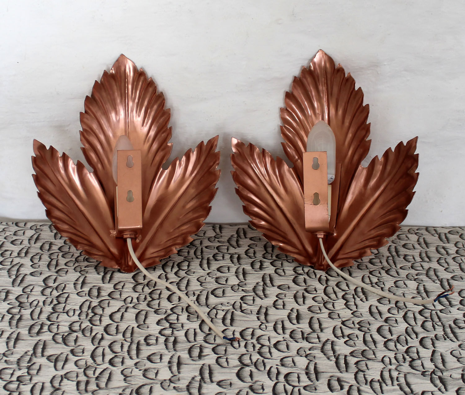 Metallic pink leaf wall lamps