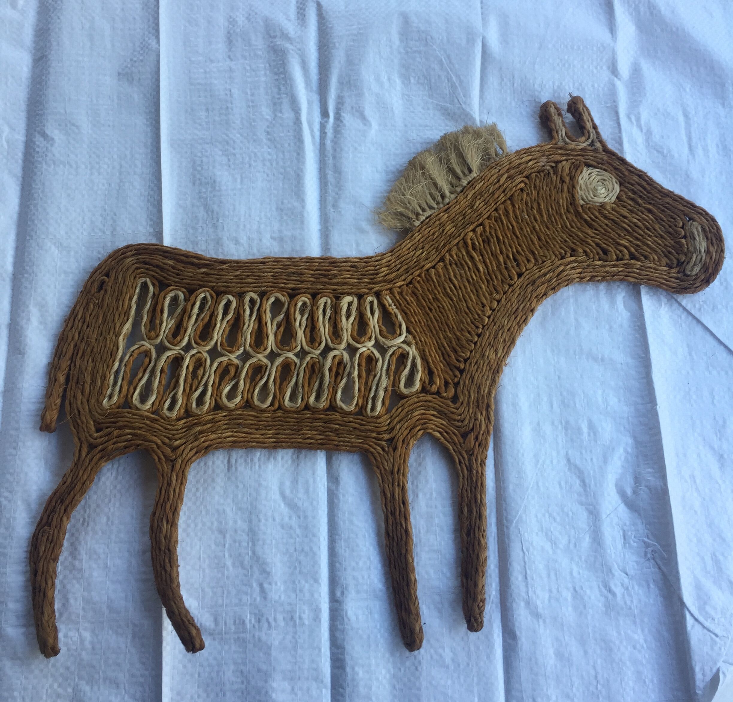 Trio of vintage rope animals table mats