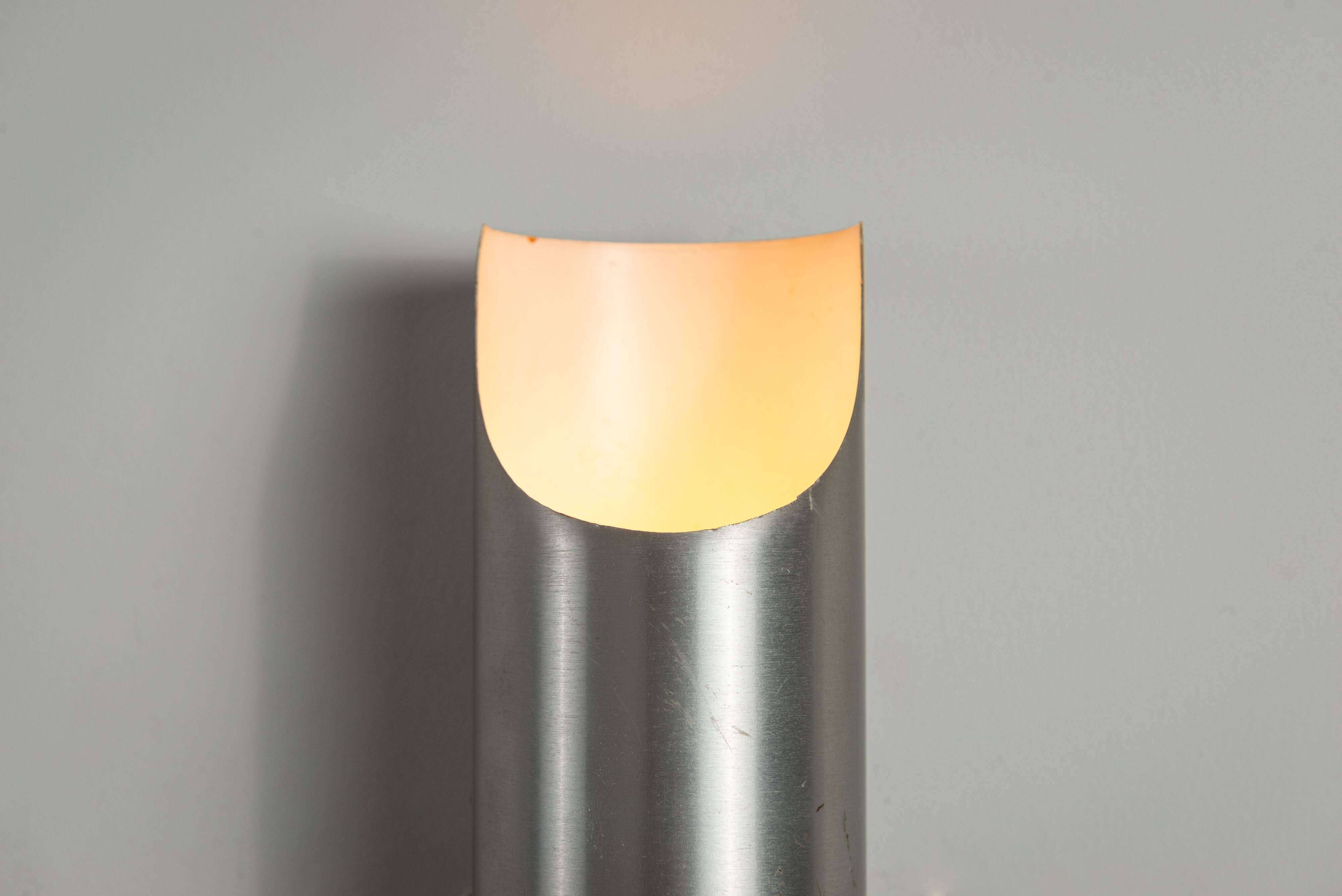 Set of three aluminium cylindrical wall lamps