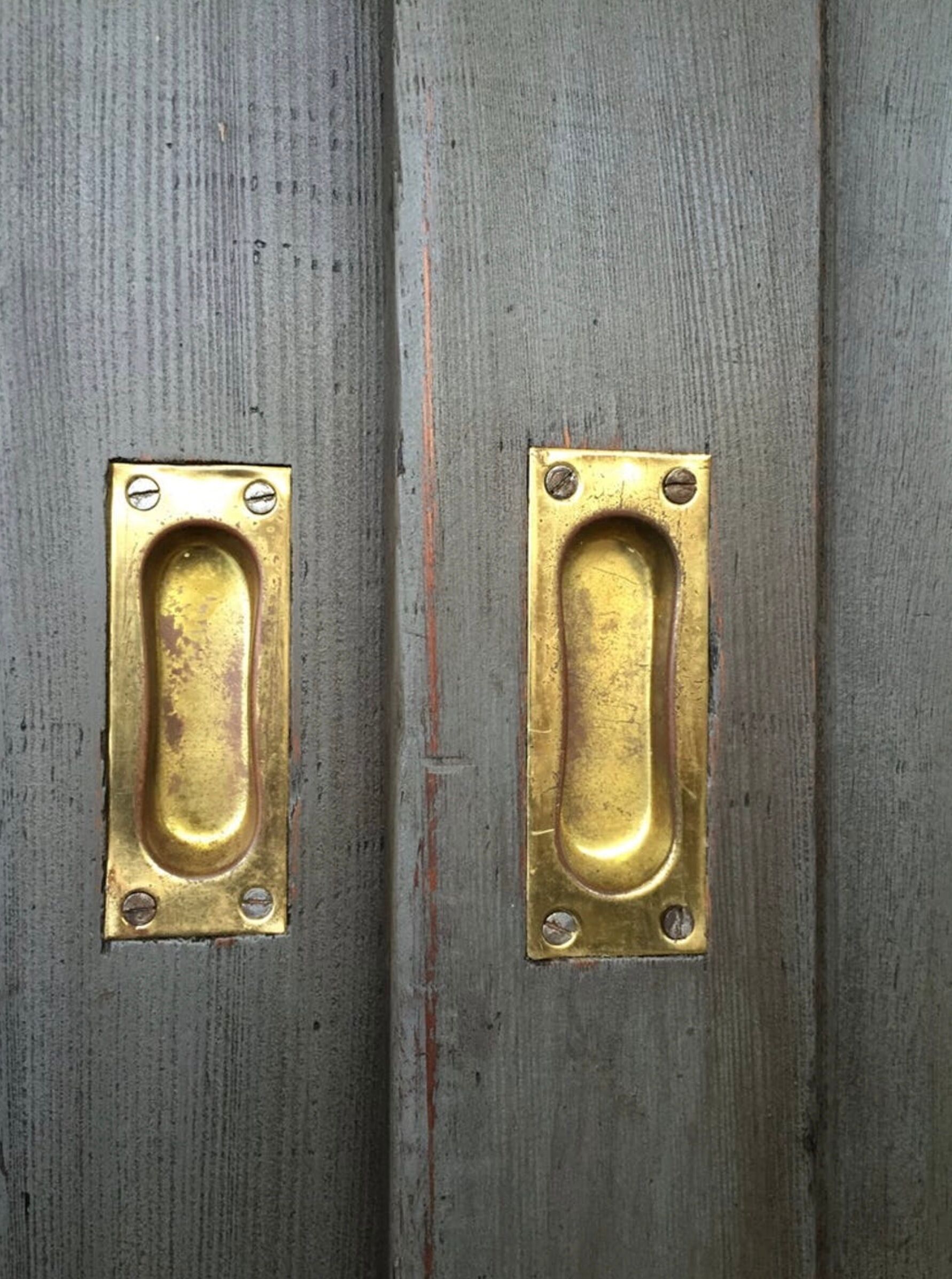 Old wooden cupboard massive sliding doors