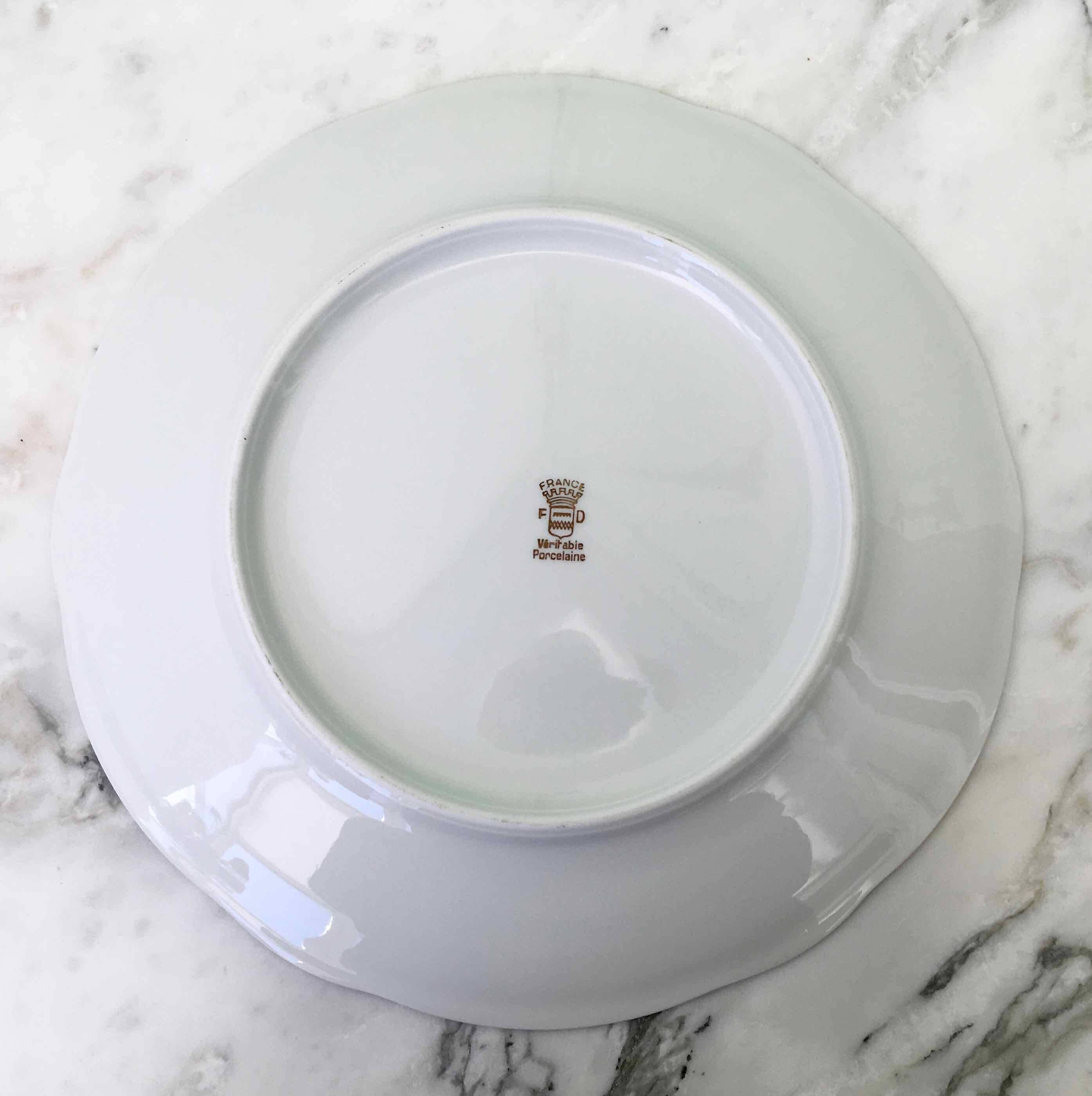 8 white and gold porcelain dessert plates