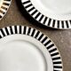 4 dessert plates in white, black and gold Limoges porcelain