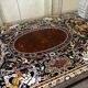 Table basse en marqueterie de marbre vers 1990