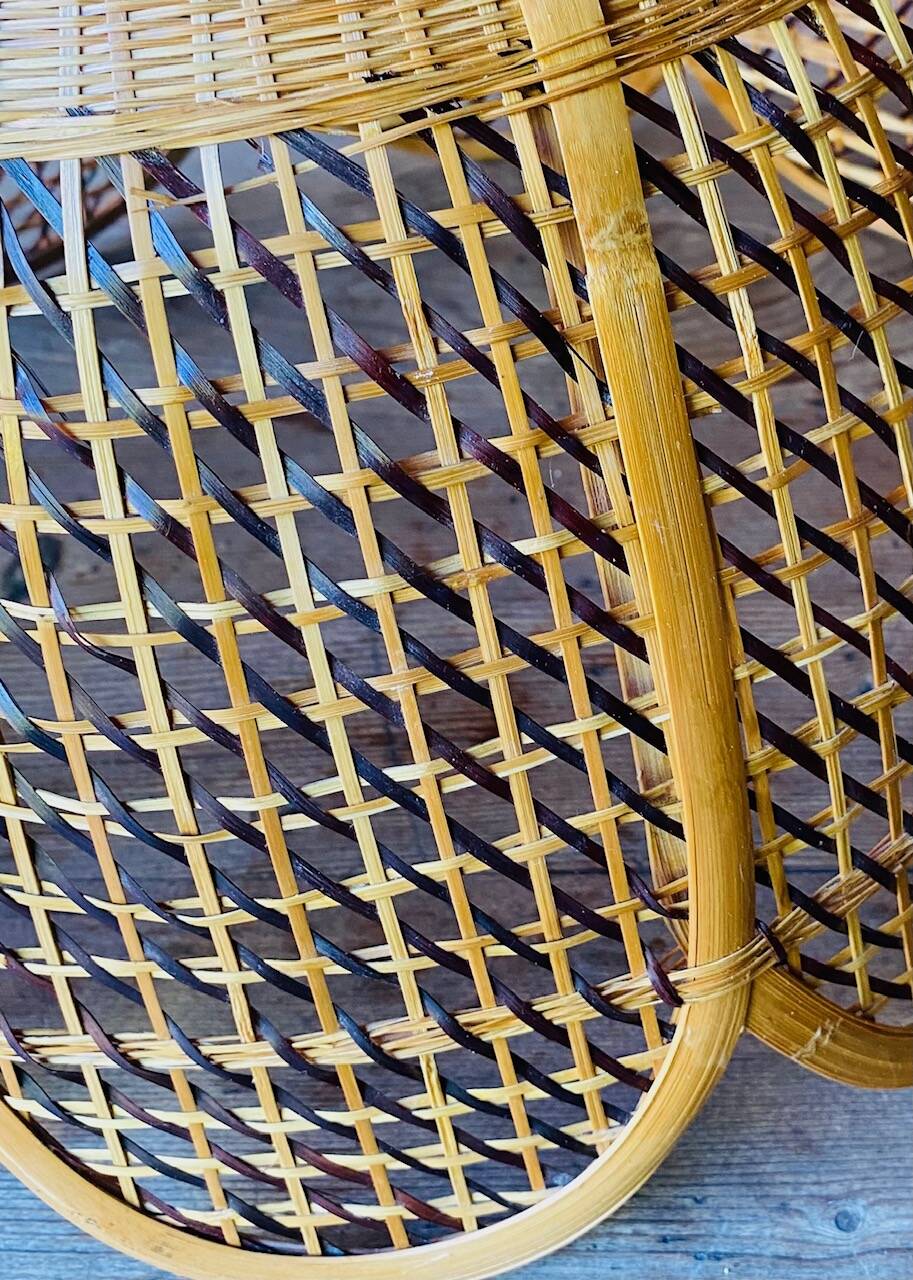 Rattan and cane lampshade in the shape of a flower from the 1970s.