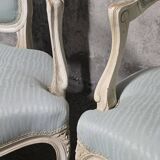 Pair of Louis XV style armchairs in patinated wood, light blue fabric.