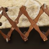 Extendable wooden coat rack with 10 old vintage hooks