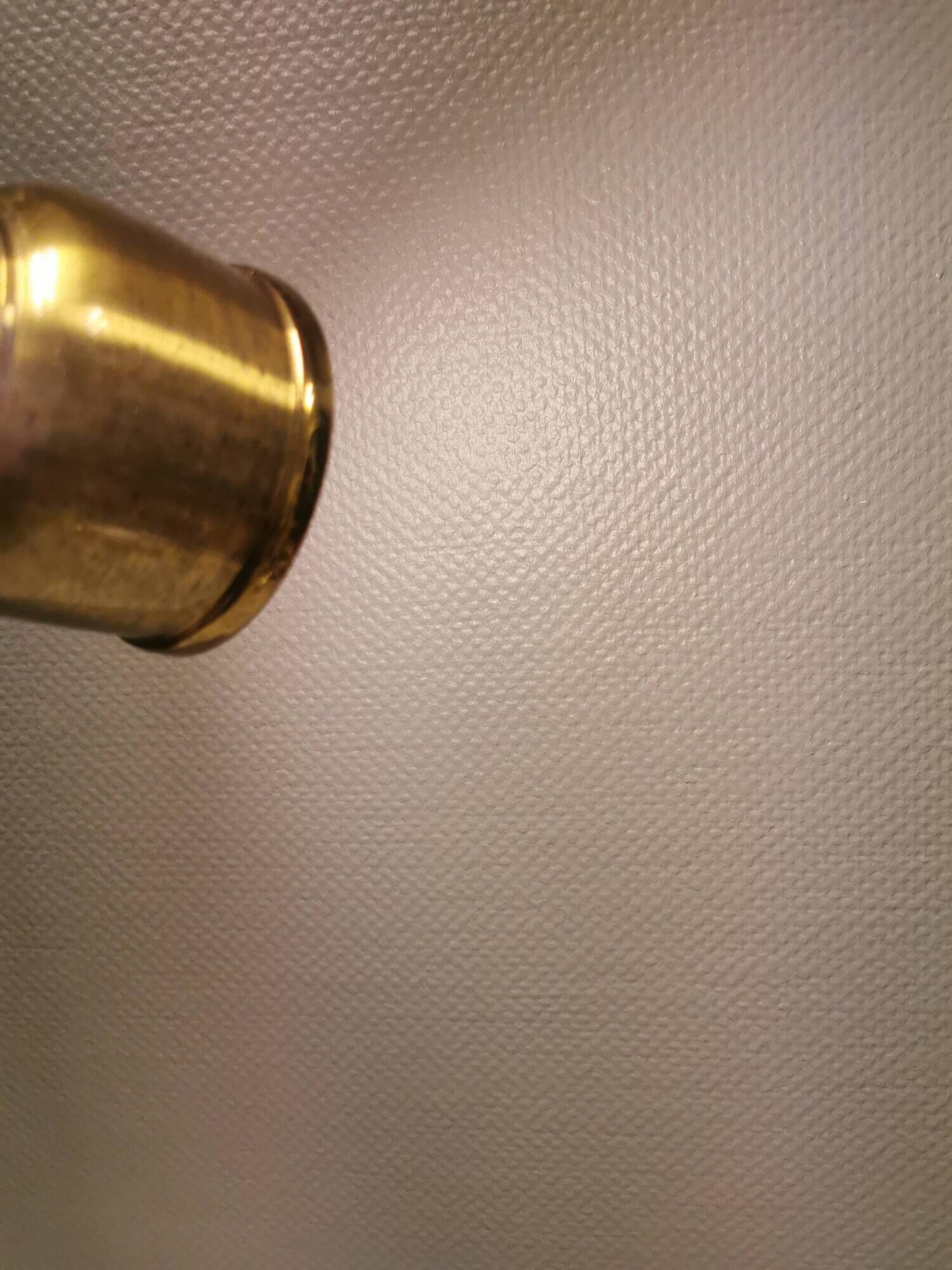 Two beautiful perforated brass hanging lamps, Danish and from the 1980s.