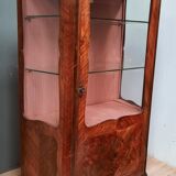 Louis xv showcase with a marble door