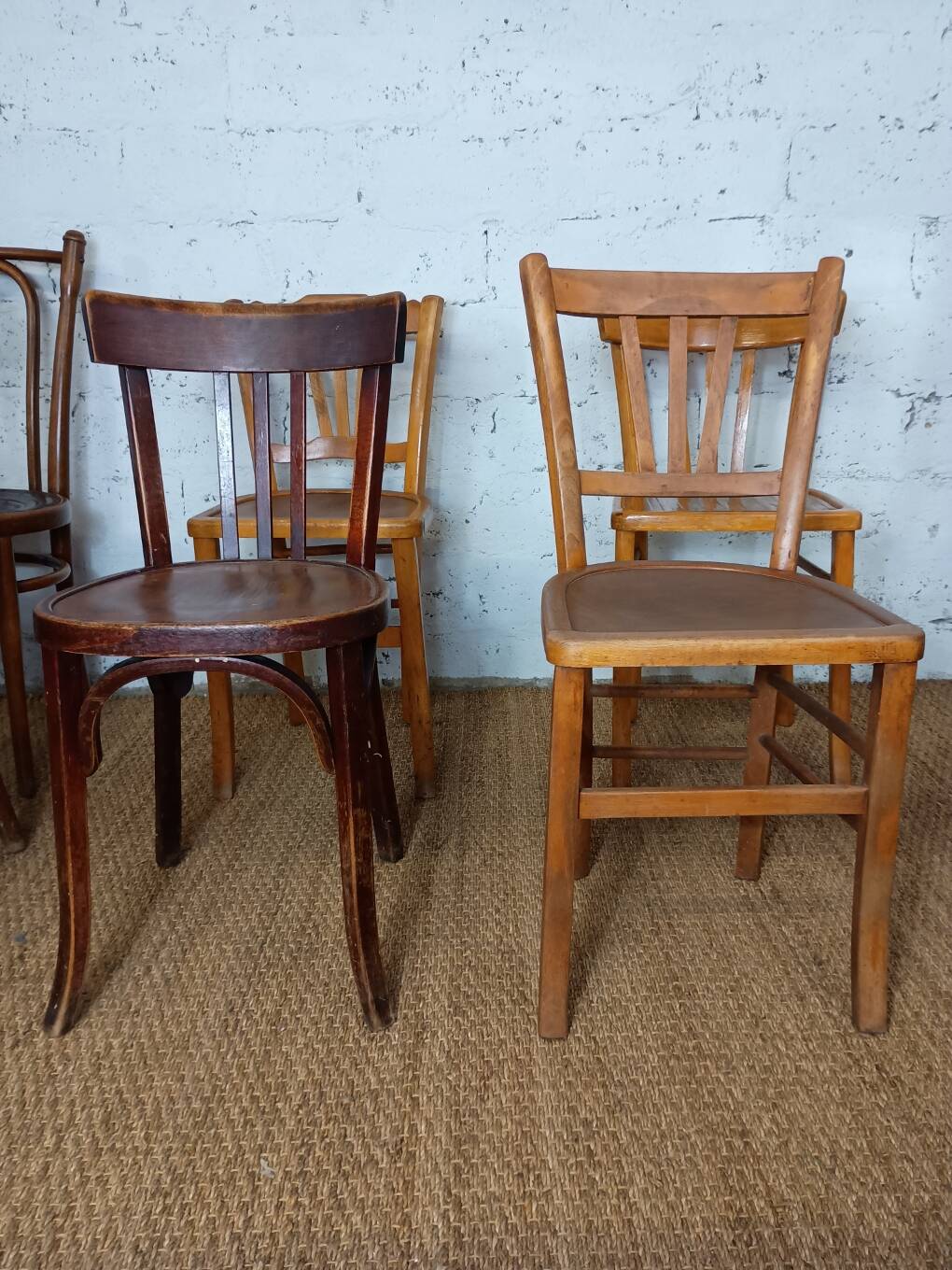 Set of 8 mismatched vintage Fischel bistro chairs