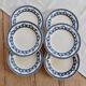 6 vintage flat plates with a blue and white goose pattern.