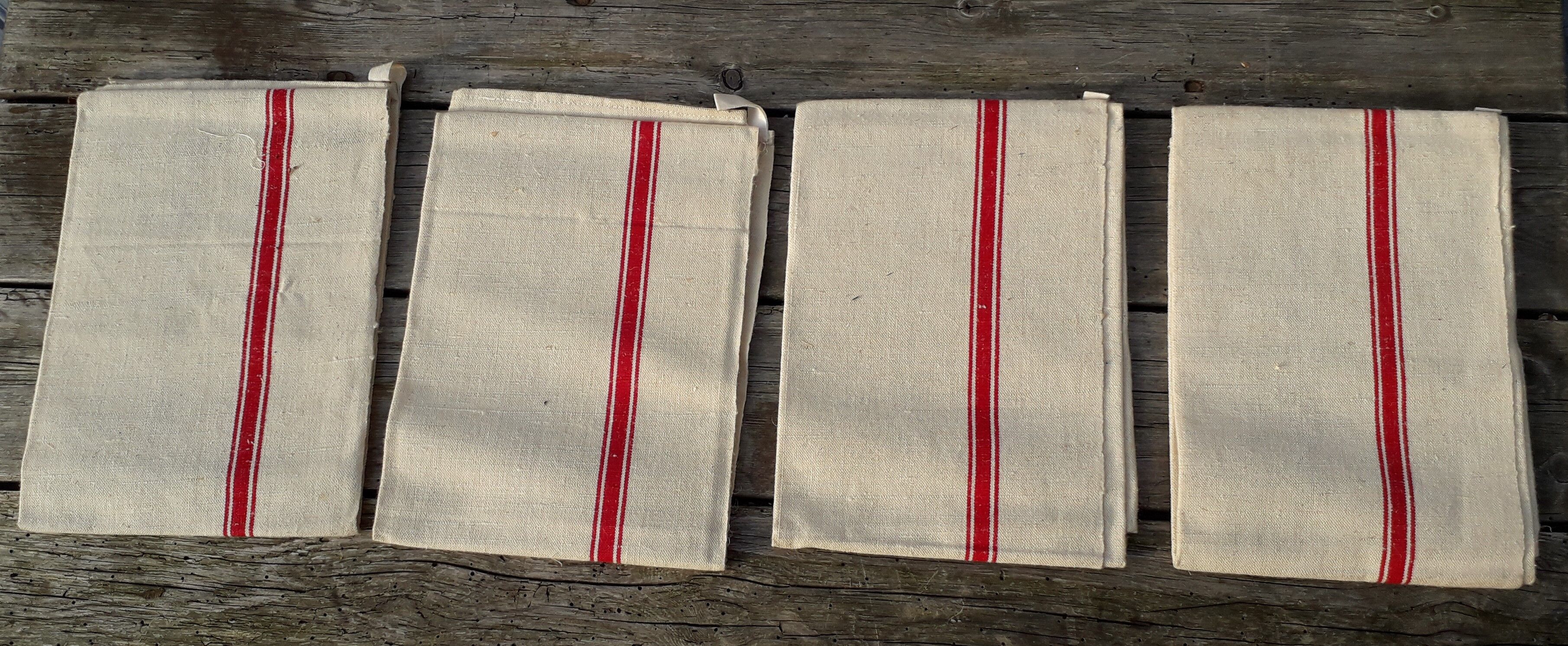 Set of 4 old embroidered tea towels in linen