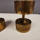 Three beautiful candle holders in solid brass, for block candles.