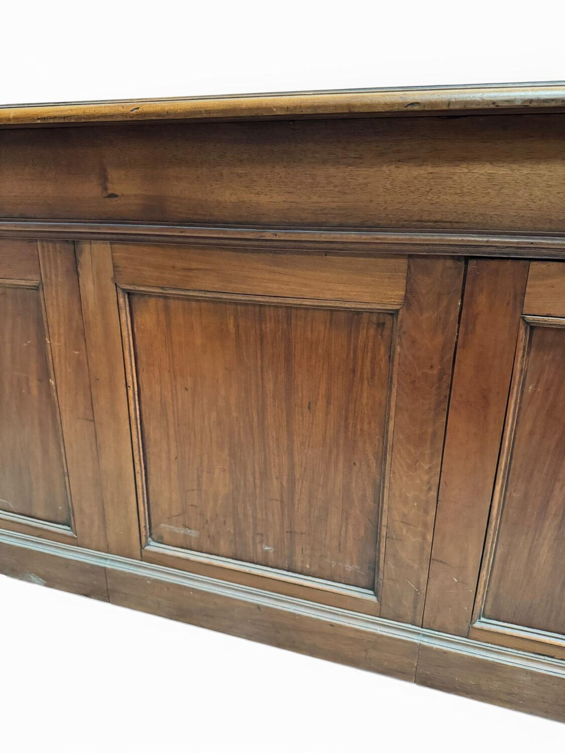 Oak desk with 9 drawers and leather writing pad.