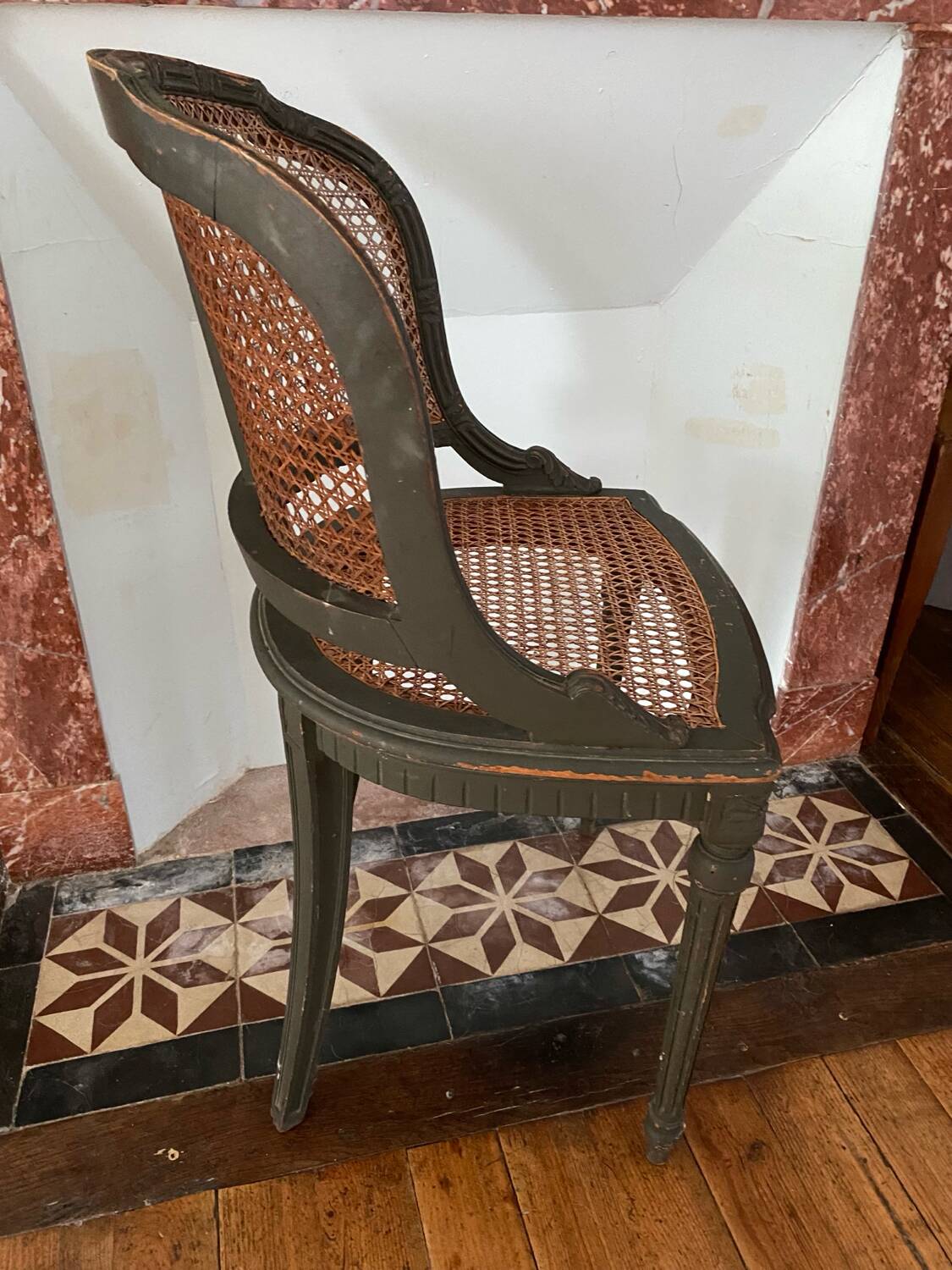 Caned armchair in Louis XVI style