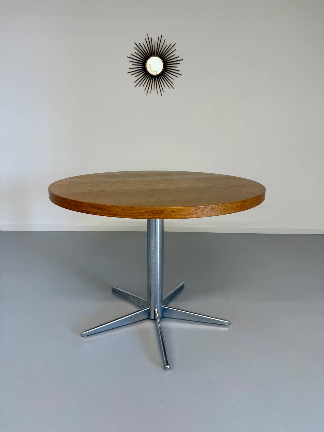 Old round table in solid wood and metal, vintage 70s design