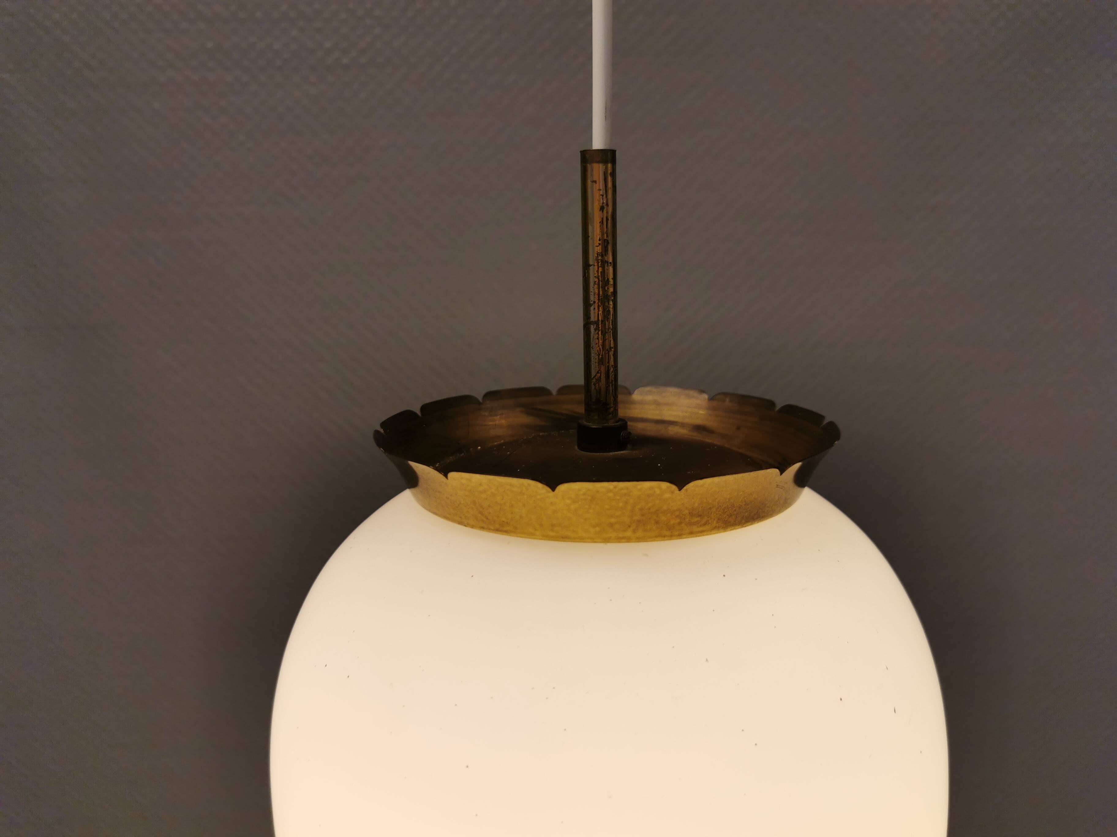 Old hanging lamp in milky white opal glass and brass top/suspension. Danish design 1930s