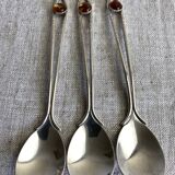 Art Nouveau metal and amber spoons
