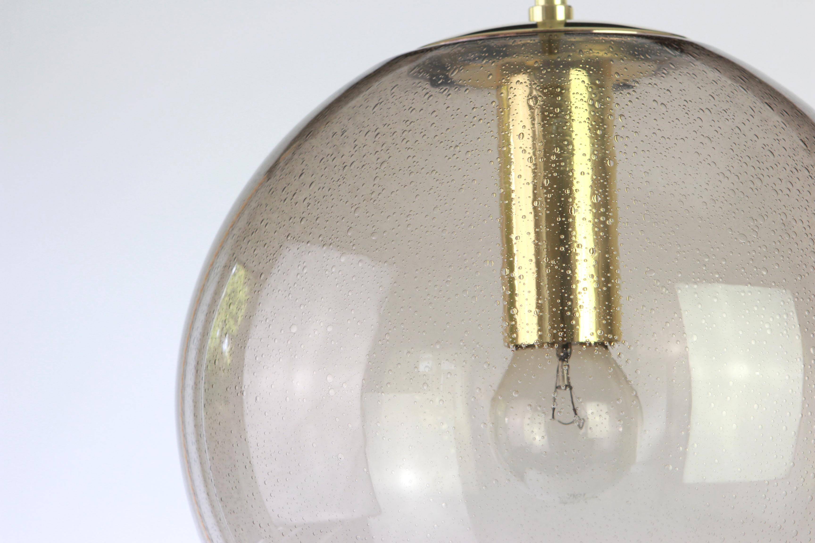 Lustre Limburg in brass with smoked glass ball, Germany, 1970s