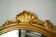 Bevelled gold mirror in Rococo style by Deknudt, Belgium, vintage.