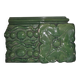 Green enamelled ceramic stove tile — finely sculpted Hungarian pattern from the late 19th century.