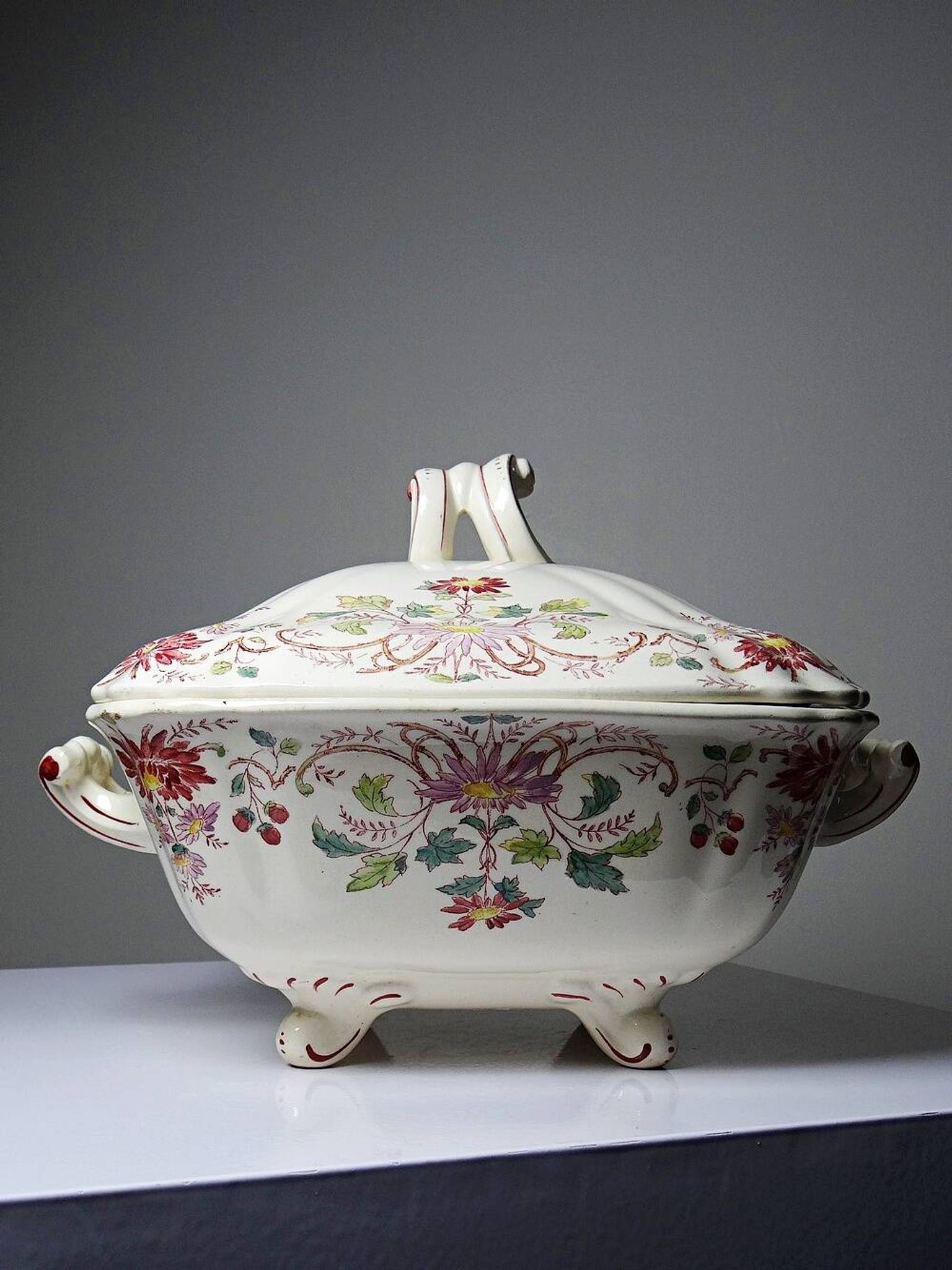 Antique Longchamp soup tureen/vegetable dish with polychrome daisies in ironstone.