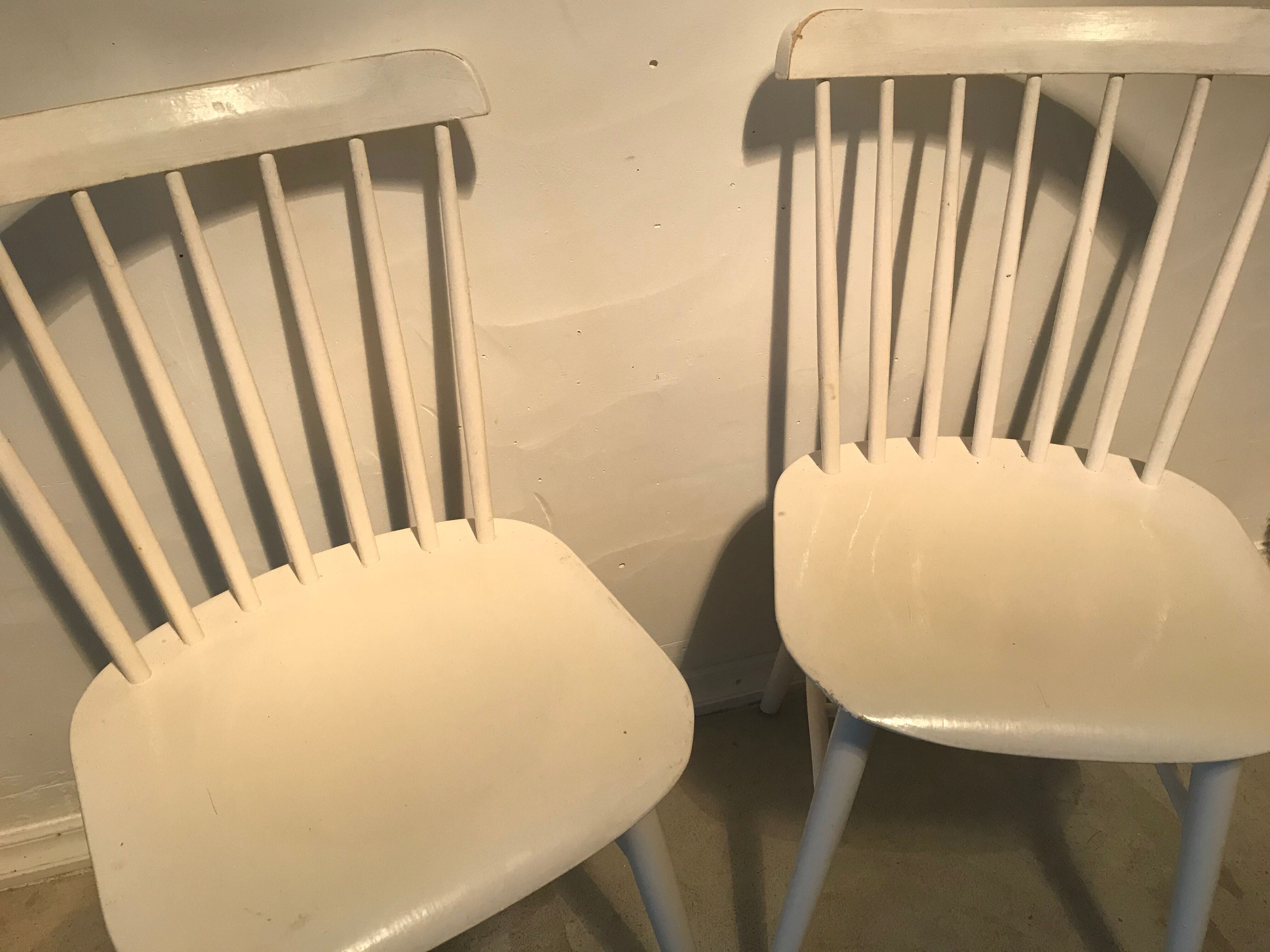 Pair of vintage chairs with compass footings