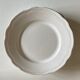 Set de 4 assiettes de Mougins en terre émaillée blanche à godrons