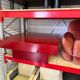 Table basse italienne rouge du milieu du siècle avec plateau en verre