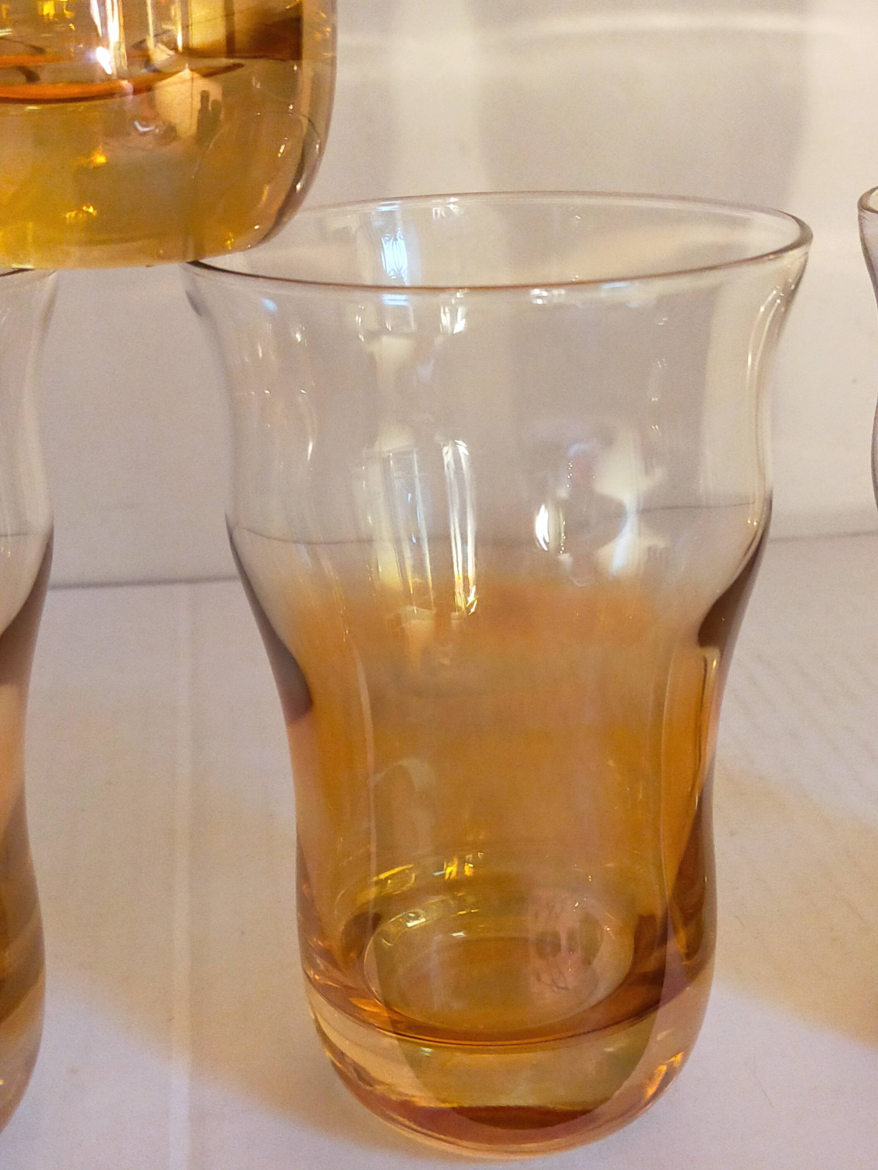 Four iridescent honey blown glass glasses