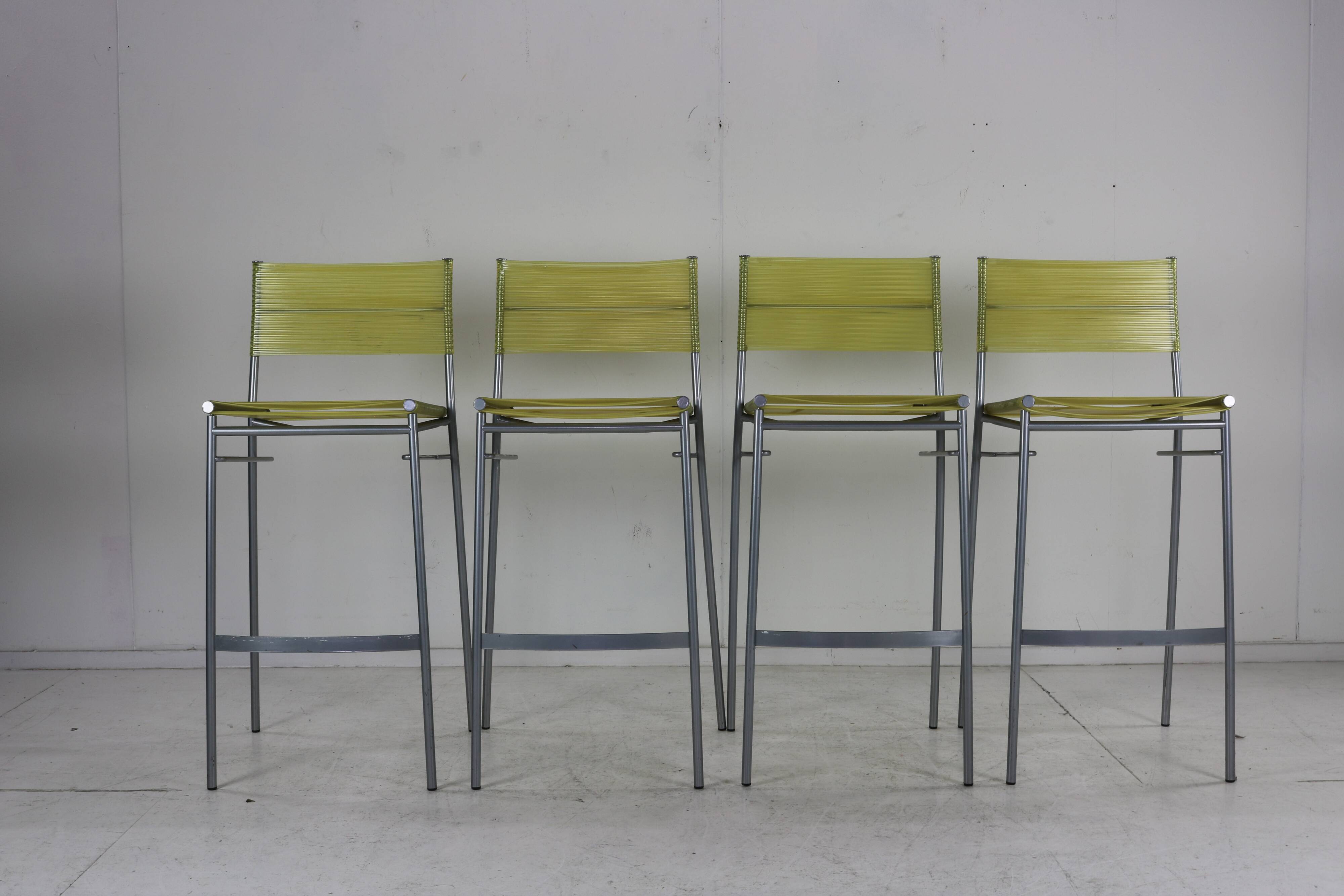 Set of four barstools by Tito Agnoli for Pierantonio Bonacina
