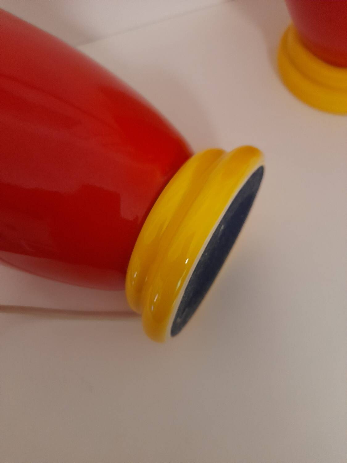 Pair of red and yellow lamp bases from the 80s