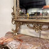 Important console table with a curved shape + Louis XV style mirror in gilded and silvered wood.