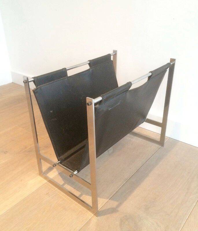 Magazine rack in brushed steel and leather, in the style of Poul Kjaerholm
