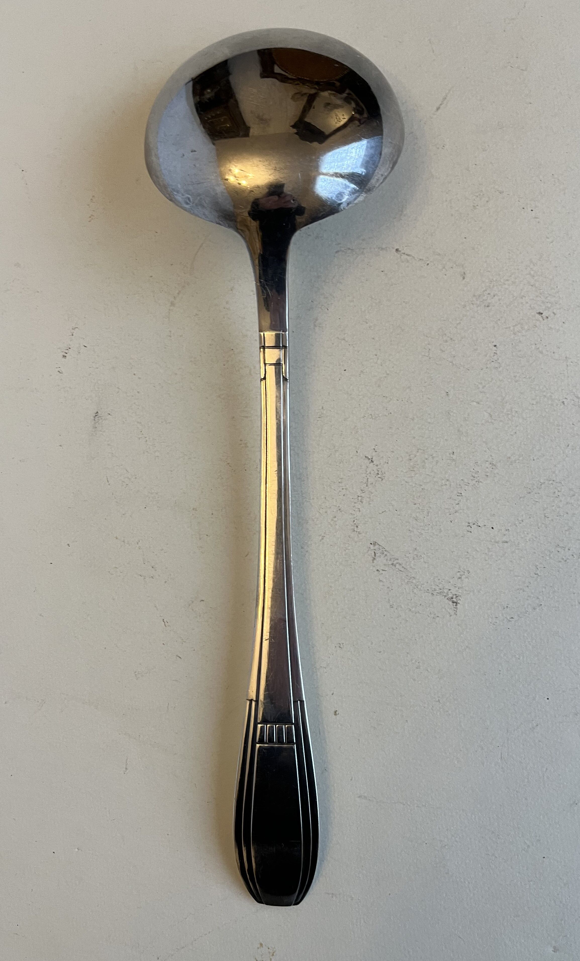 Silver metal ladle