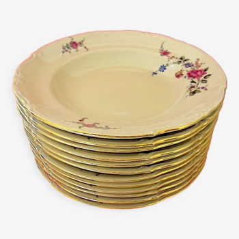 Suite of twelve round and hollow soup plates